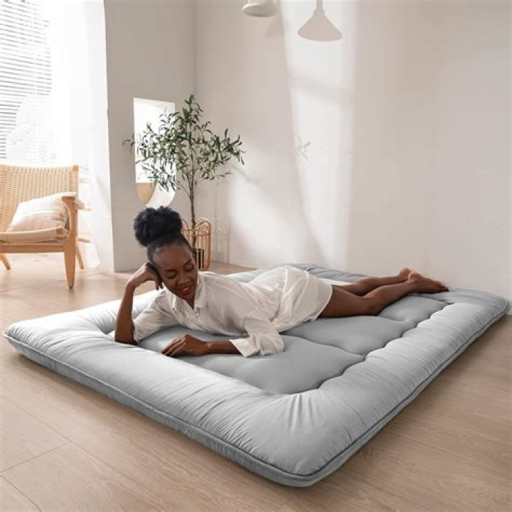 Is it OK to sleep on a mattress on the floor?