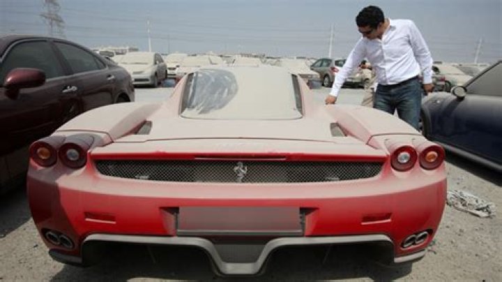Why are luxury cars abandoned in Dubai?
